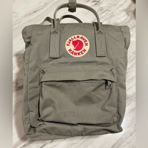 Grey Fjällräven tote bag designed with top handles and a shoulder strap